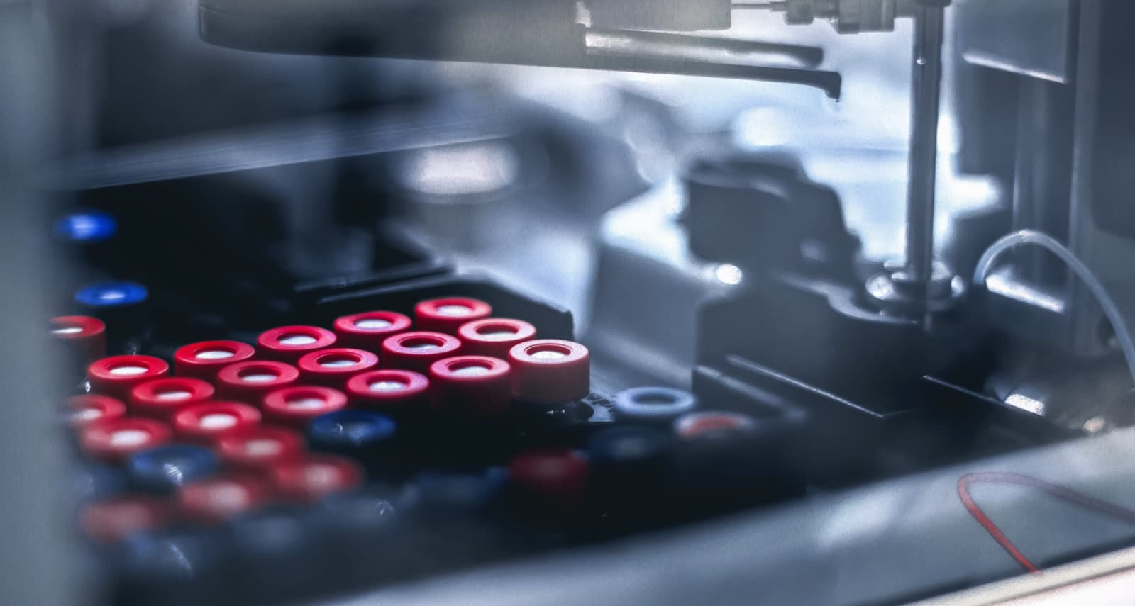 Close-up of sample vials in an HPLC autosampler tray
