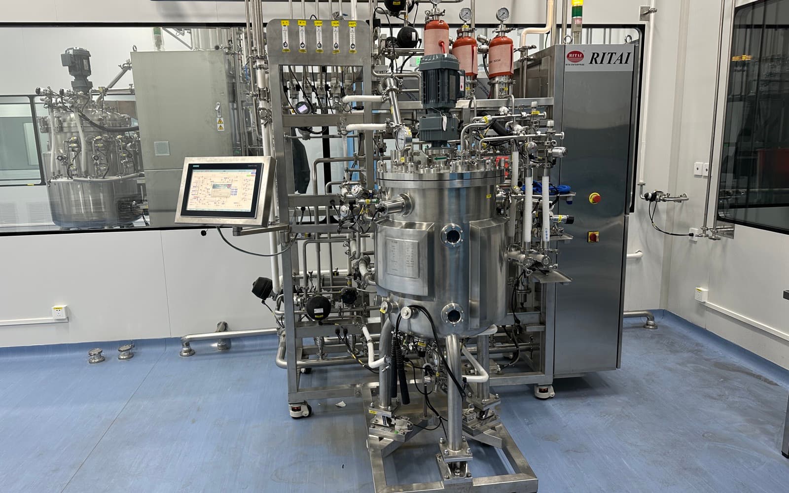 Stainless-steel bioreactor in a bioprocessing cleanroom